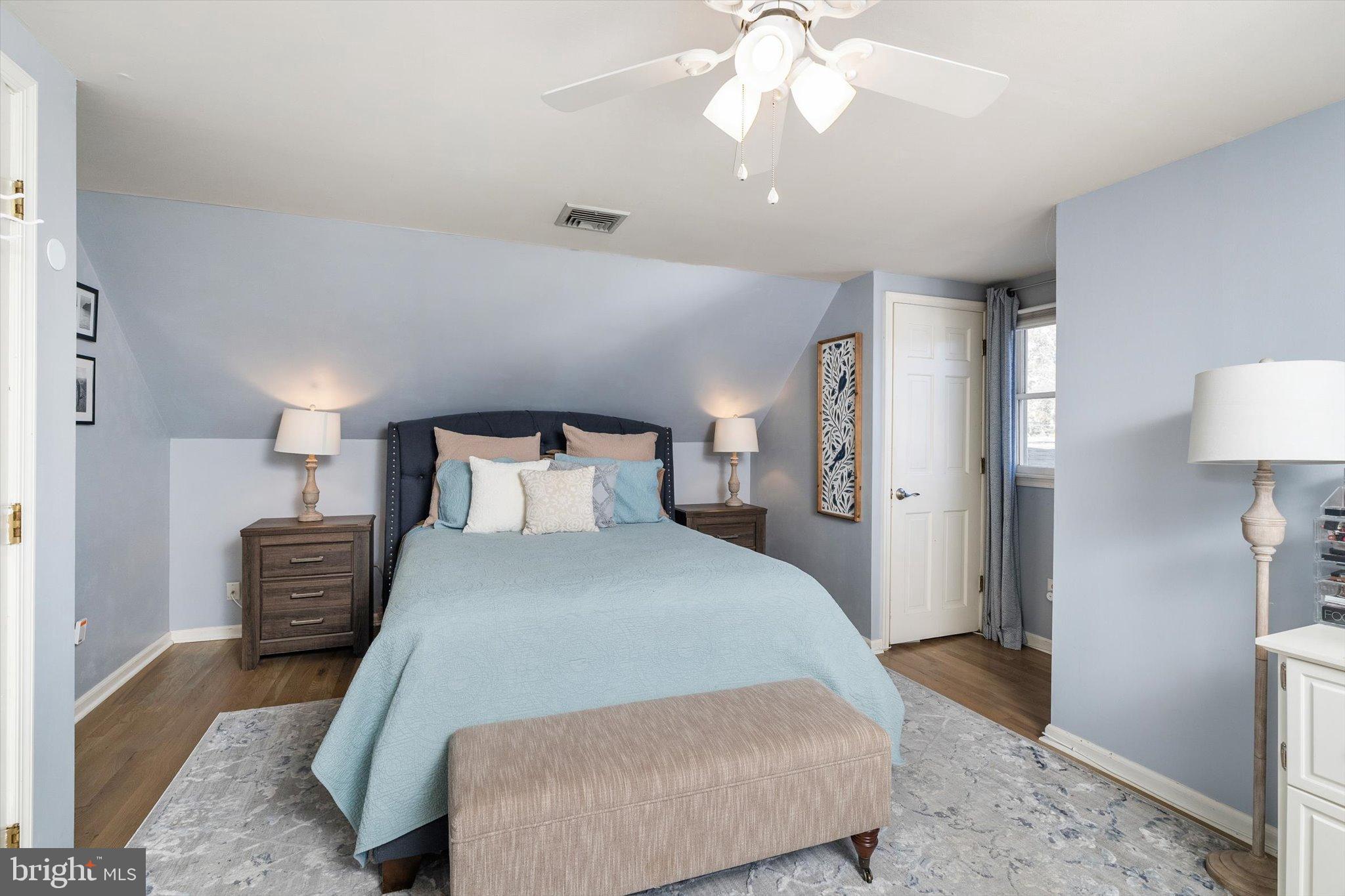 23 Beaumont Road Hamilton, NJ 08620 - Photo 22 of 45 a bedroom with a bed and a chandelier