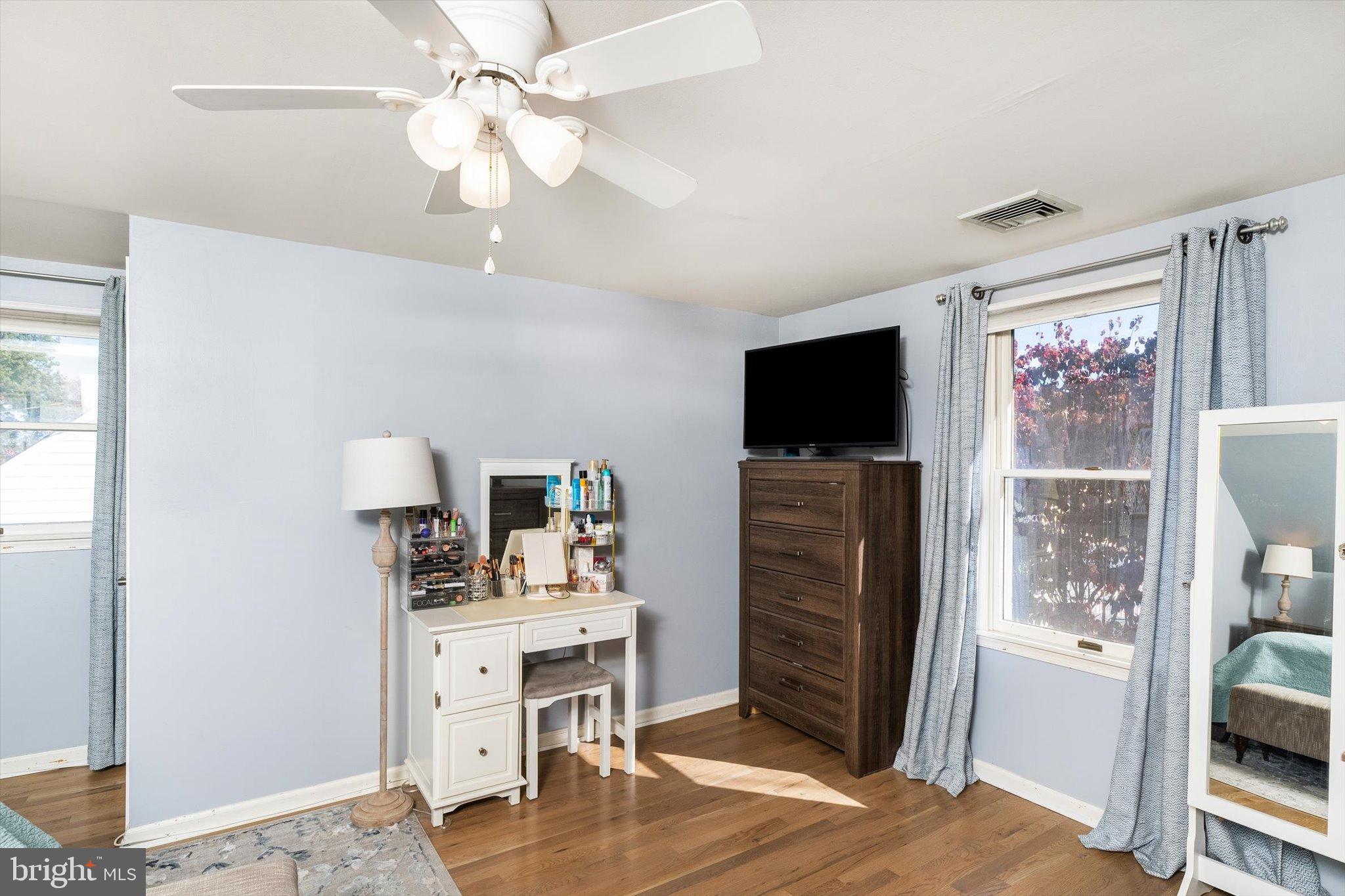 23 Beaumont Road Hamilton, NJ 08620 - Photo 24 of 45 a view of a livingroom with furniture and a flat screen tv