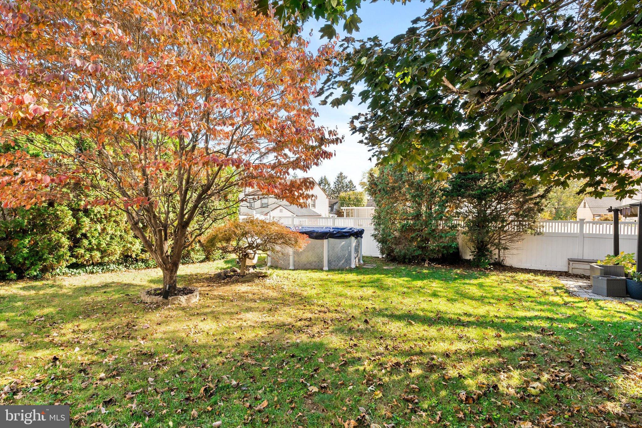 23 Beaumont Road Hamilton, NJ 08620 - Photo 30 of 45 a view of yard with tree and wooden fence