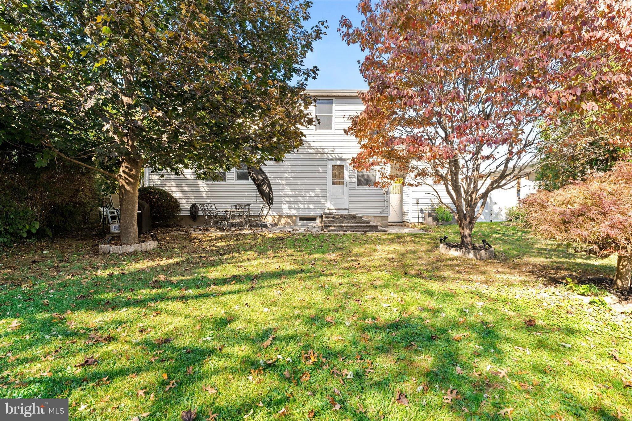 23 Beaumont Road Hamilton, NJ 08620 - Photo 31 of 45 a bathroom with a toilet sink and large trees