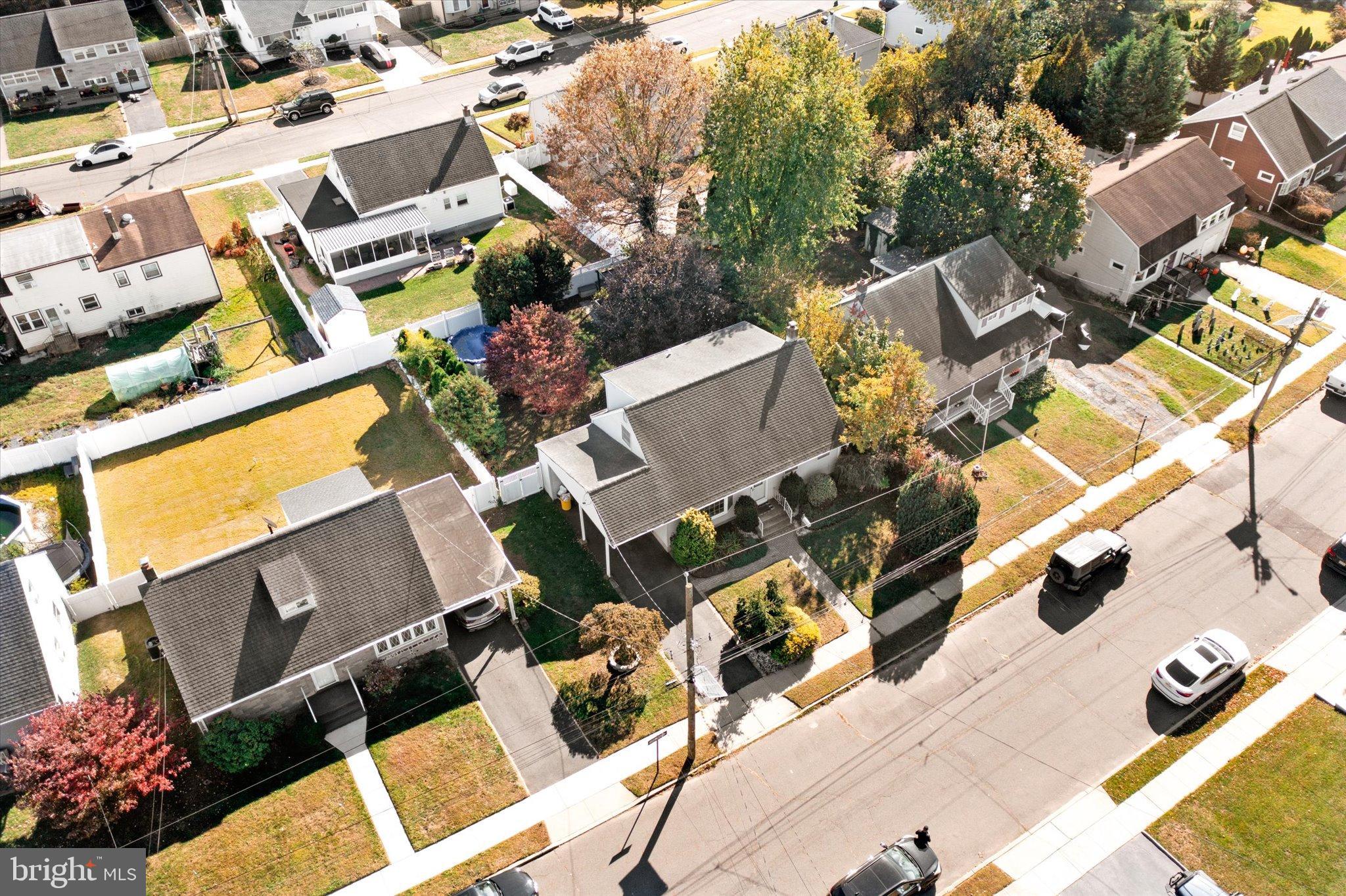 23 Beaumont Road Hamilton, NJ 08620 - Photo 4 of 45 an aerial view of a house with a yard and garden