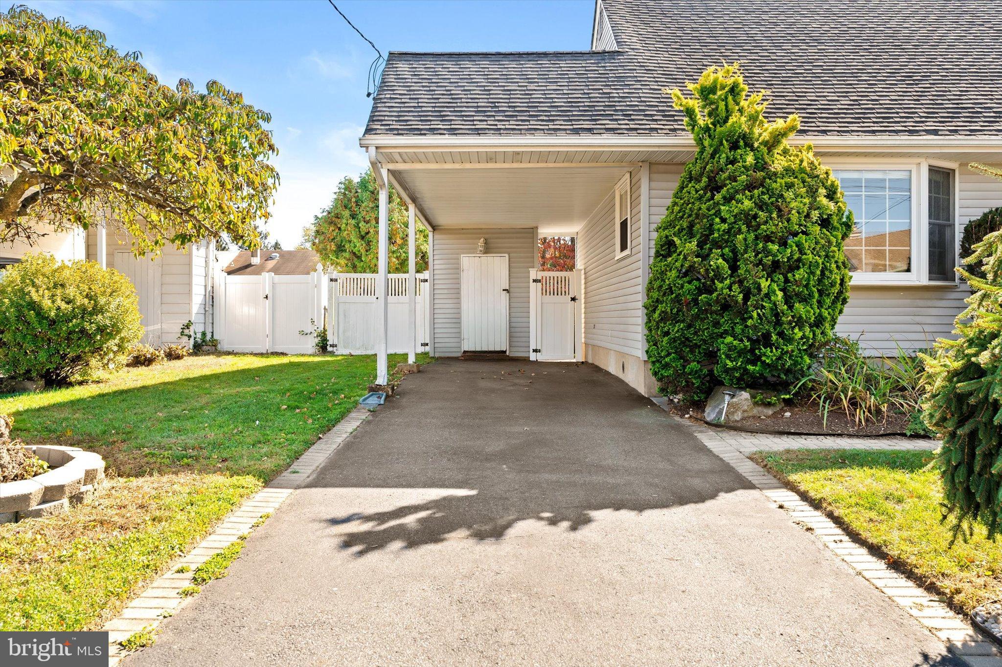 23 Beaumont Road Hamilton, NJ 08620 - Photo 6 of 45 a front view of a house with garden