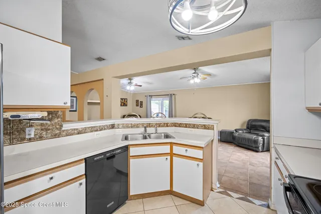 a kitchen with a stove and a microwave