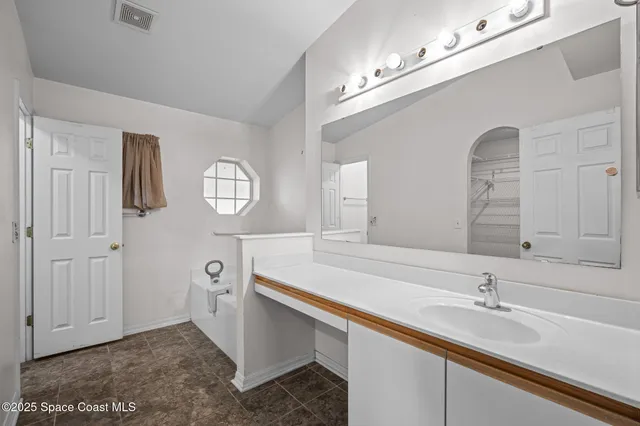 a bathroom with a shower and a toilet