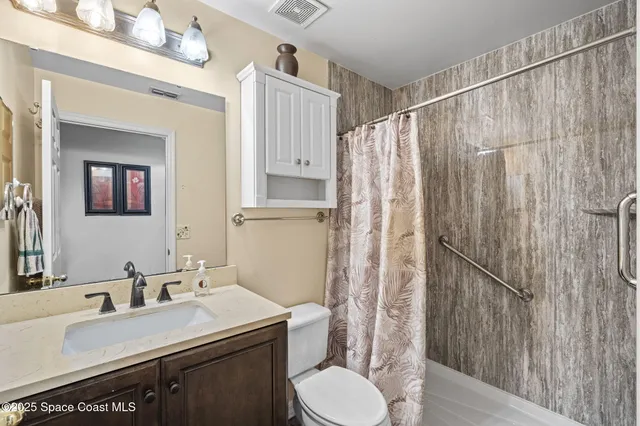 a bedroom with a bed and a closet