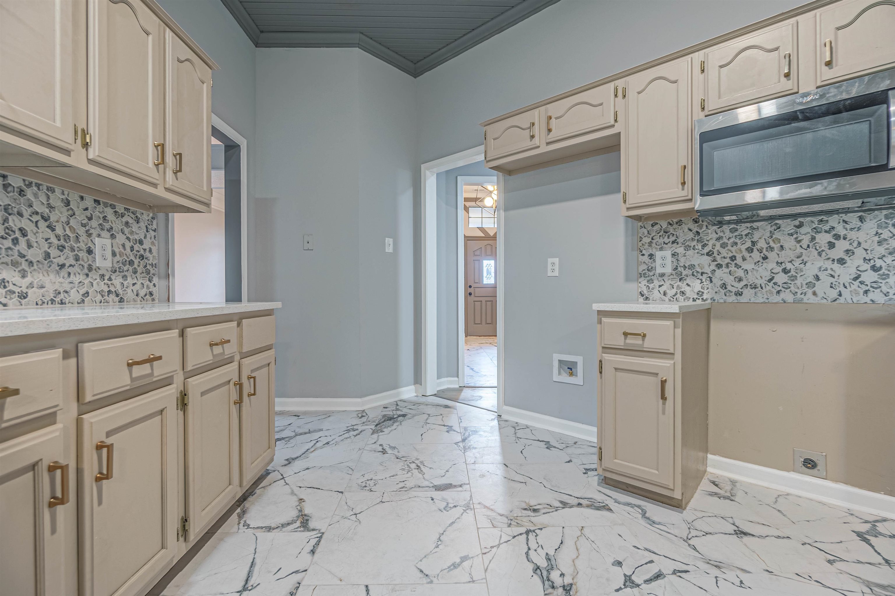 5406 Ross Road Memphis, TN 38141 - Photo 11 of 27 a view of cabinets with window