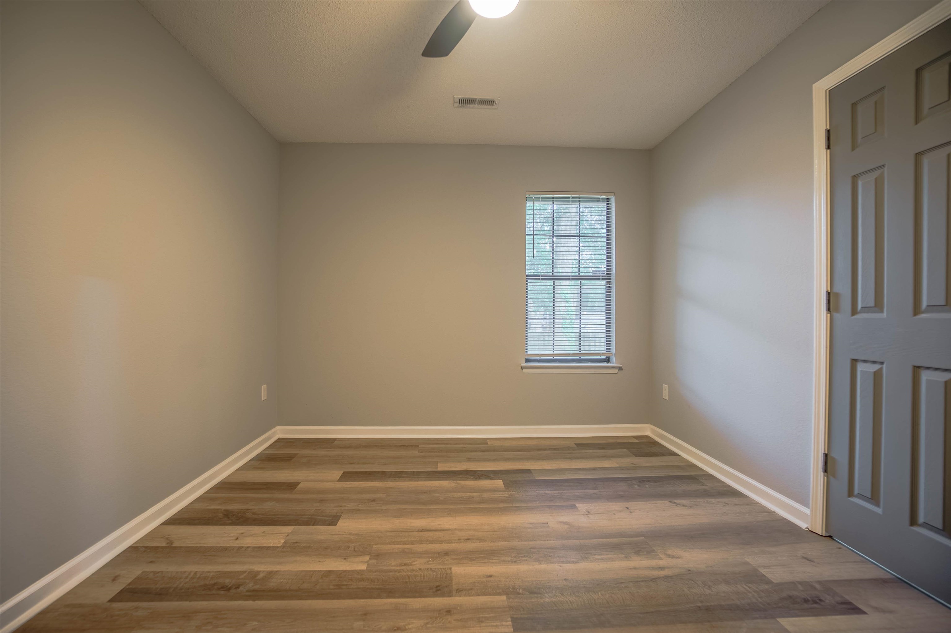 5406 Ross Road Memphis, TN 38141 - Photo 24 of 27 a view of room with window and ceiling fan