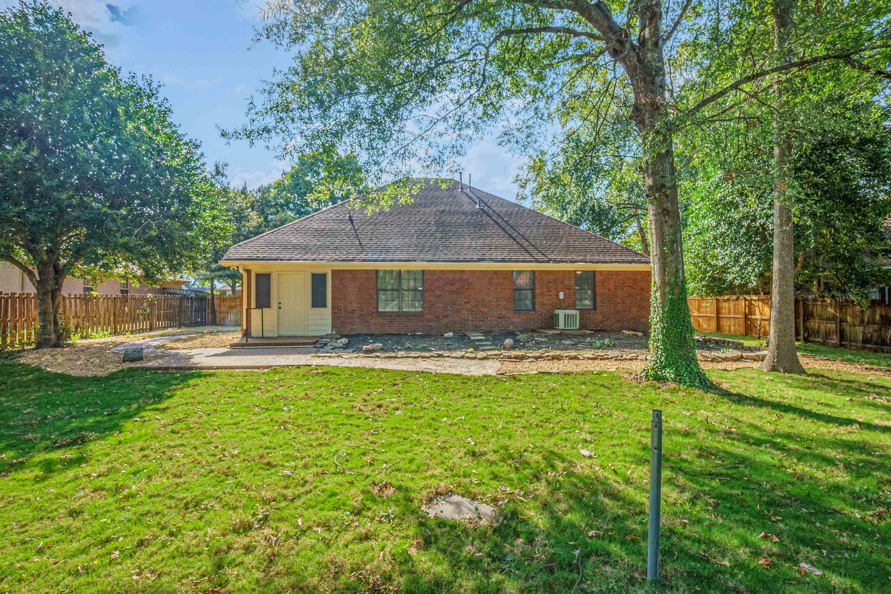 5406 Ross Road Memphis, TN 38141 - Photo 27 of 27 a front view of house with yard and trees