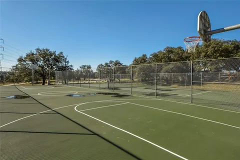 a view of a yard with swimming pool
