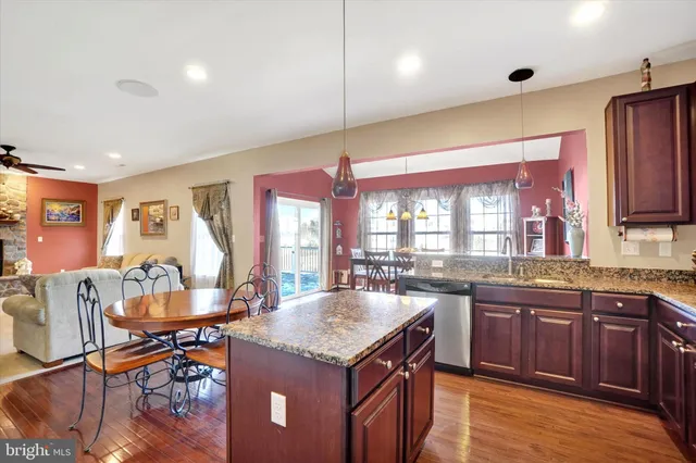 a kitchen with granite countertop a sink and counter space