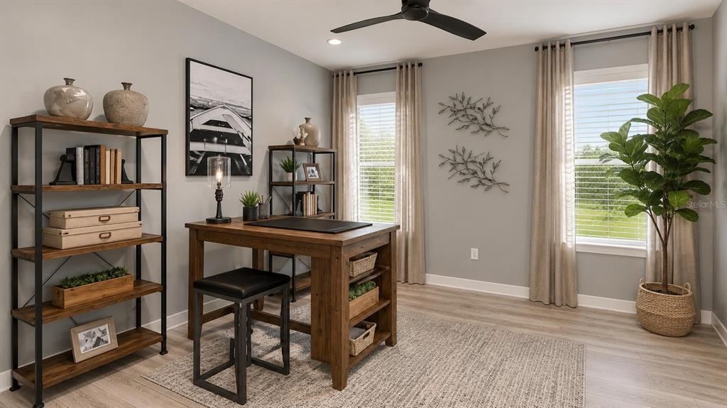 33320 Castaway Loop Wesley Chapel, FL 33543 - Photo 13 of 23 a view of a livingroom with furniture and window