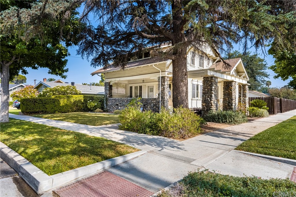 633 East Maple Avenue Orange, CA 92866 - Photo 1 of 51 a front view of a house with garden