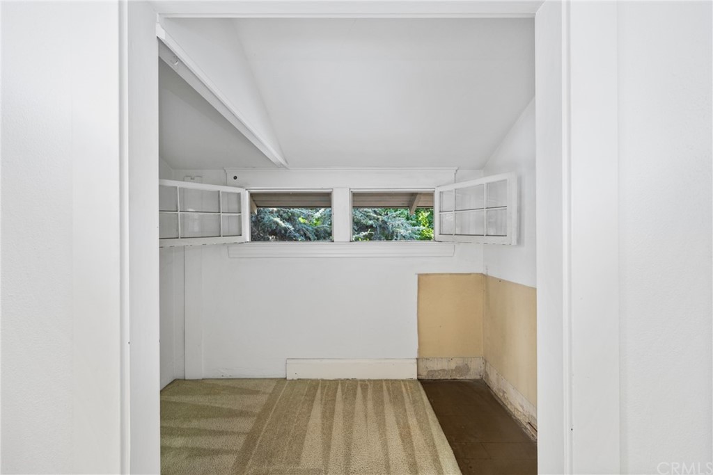 633 East Maple Avenue Orange, CA 92866 - Photo 28 of 51 a view of room with window and hallway