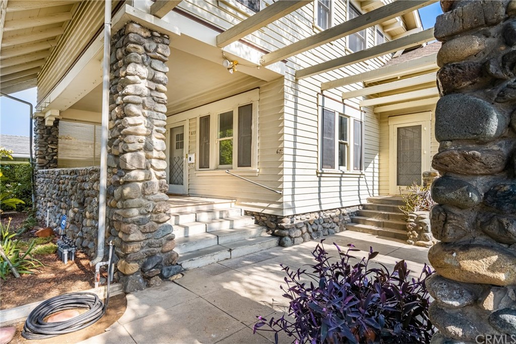 633 East Maple Avenue Orange, CA 92866 - Photo 4 of 51 a view of a house with a small backyard and sitting area