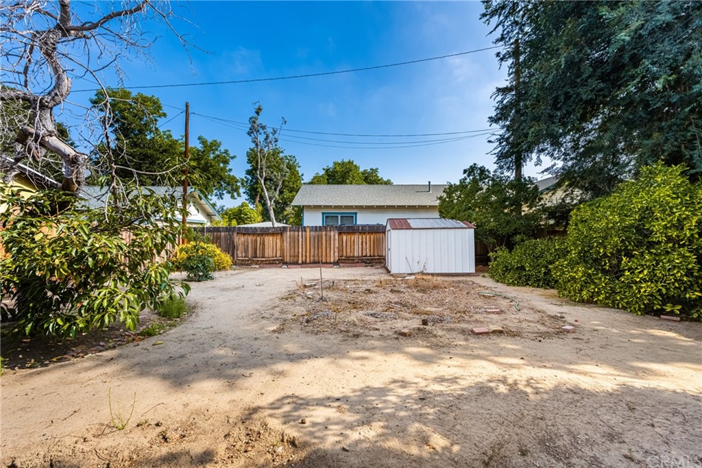 633 East Maple Avenue Orange, CA 92866 - Photo 41 of 51 a view of a house with a yard and potted plants