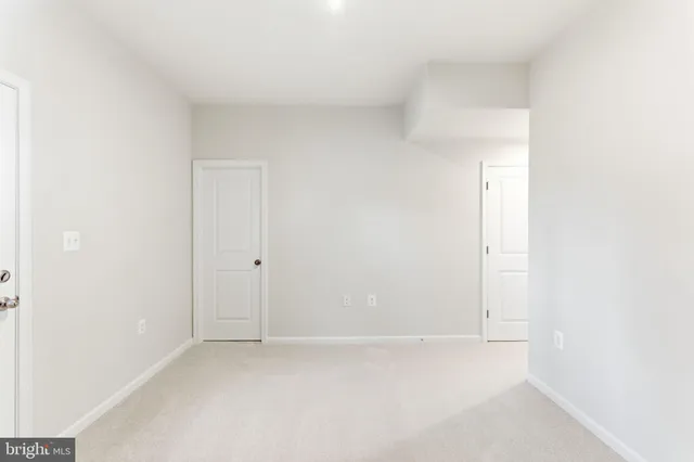 a view of a roof deck with wooden floor and fence