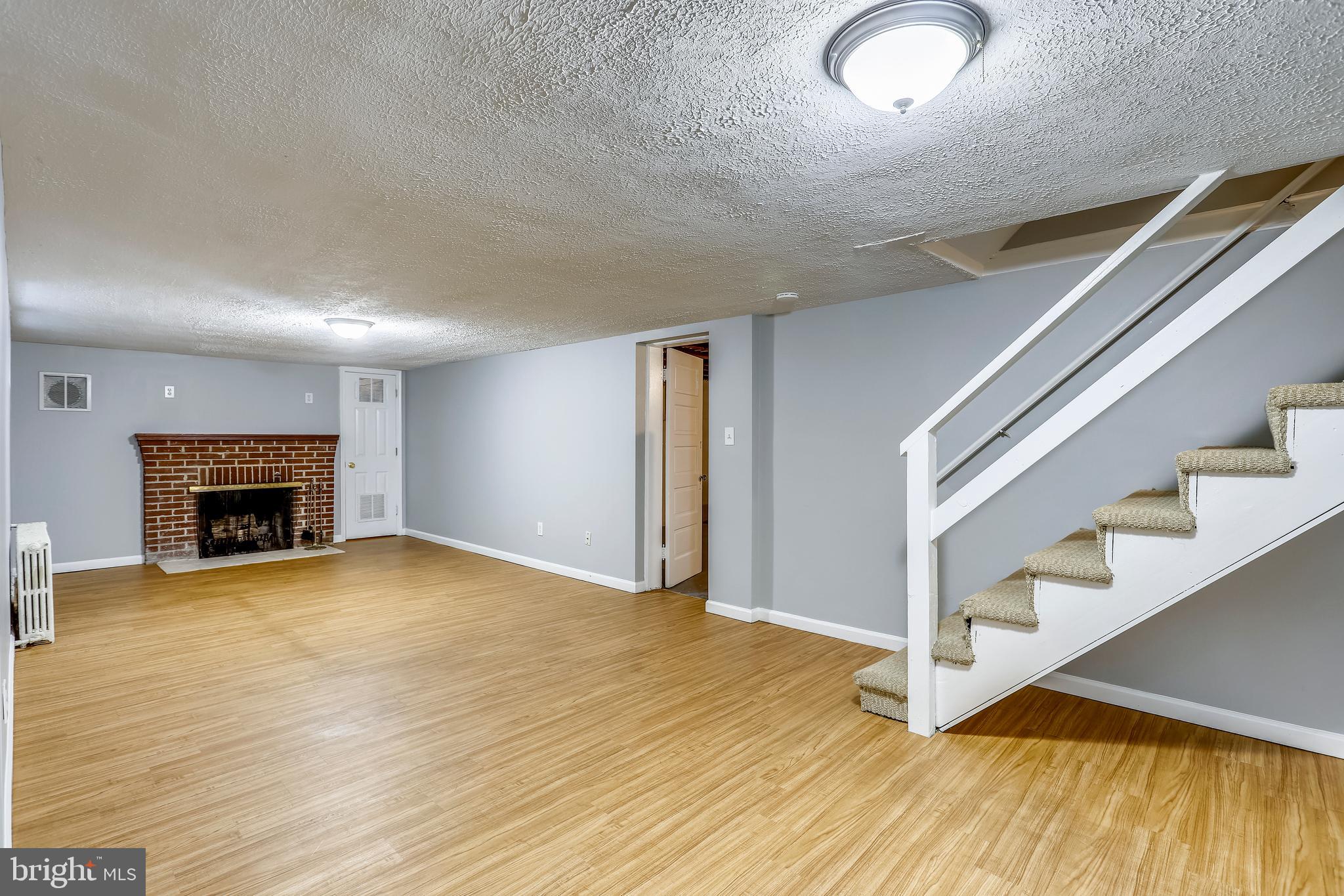 1815 Myrtle Road Silver Spring, MD 20902 - Photo 26 of 33 Recreation Room with wood burning Fireplace