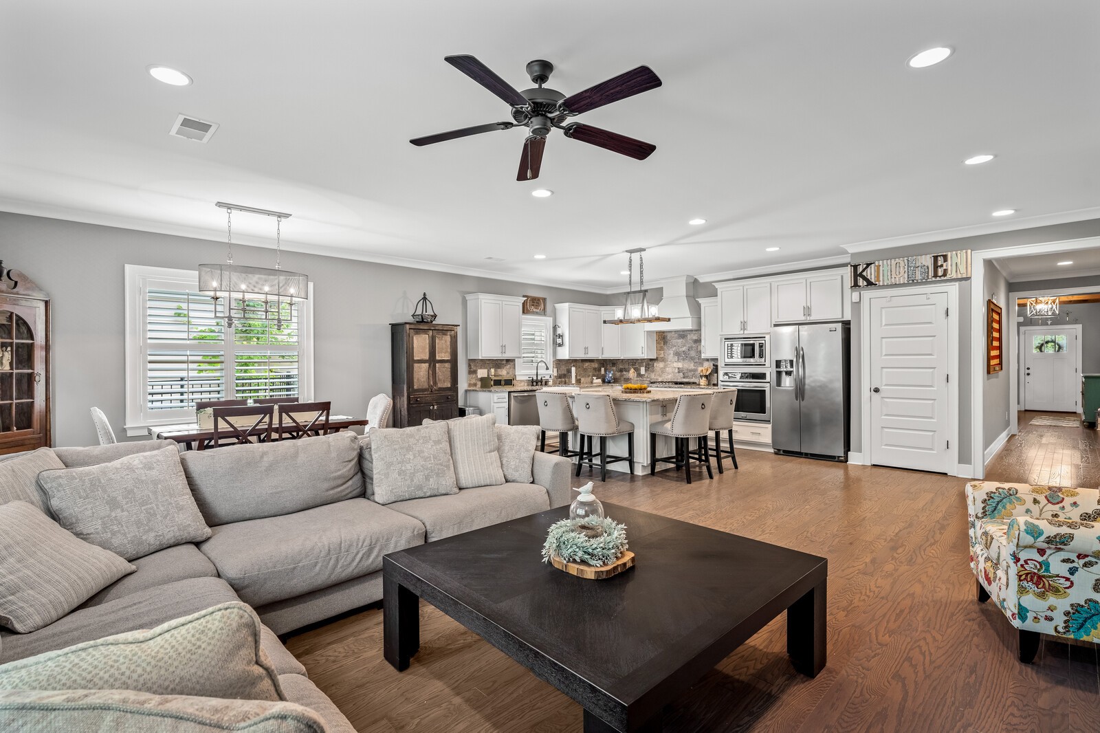 1036 Beamon Drive Franklin, TN 37064 - Photo 21 of 57 a living room with furniture kitchen view and a chandelier