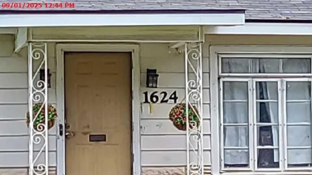 a front view of a house with a door