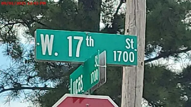 a sign that is on the side of the road