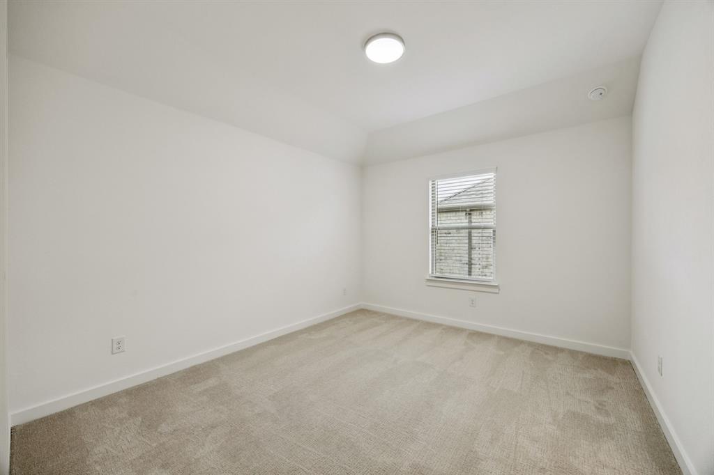 1904 Palmetto Road Celina, TX 75009 - Photo 22 of 32 an empty room with a window