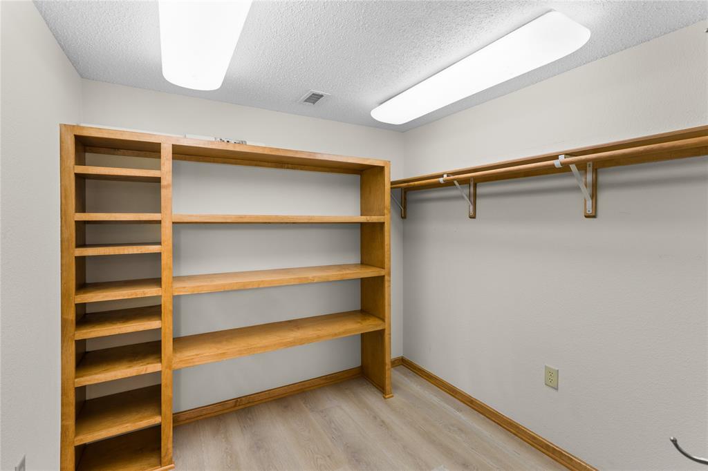 692 Private Road 5937 Emory, TX 75440 - Photo 27 of 40 a view of walk in closet with empty racks
