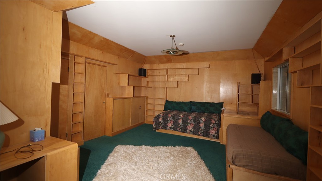 9400 McKinley Road Kelseyville, CA 95451 - Photo 17 of 31 a living room with furniture and a fireplace