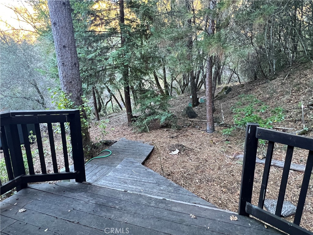 9400 McKinley Road Kelseyville, CA 95451 - Photo 21 of 31 a view of a wooden fence