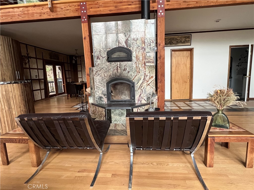 9400 McKinley Road Kelseyville, CA 95451 - Photo 23 of 31 a view of a couches and dinning table in the balcony
