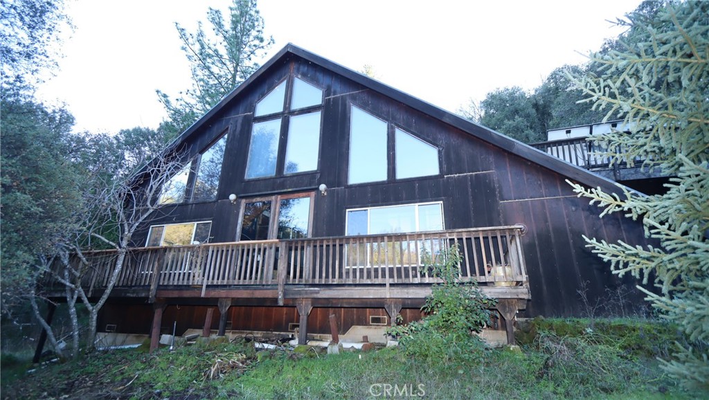 9400 McKinley Road Kelseyville, CA 95451 - Photo 24 of 31 a front view of a house with balcony and garden