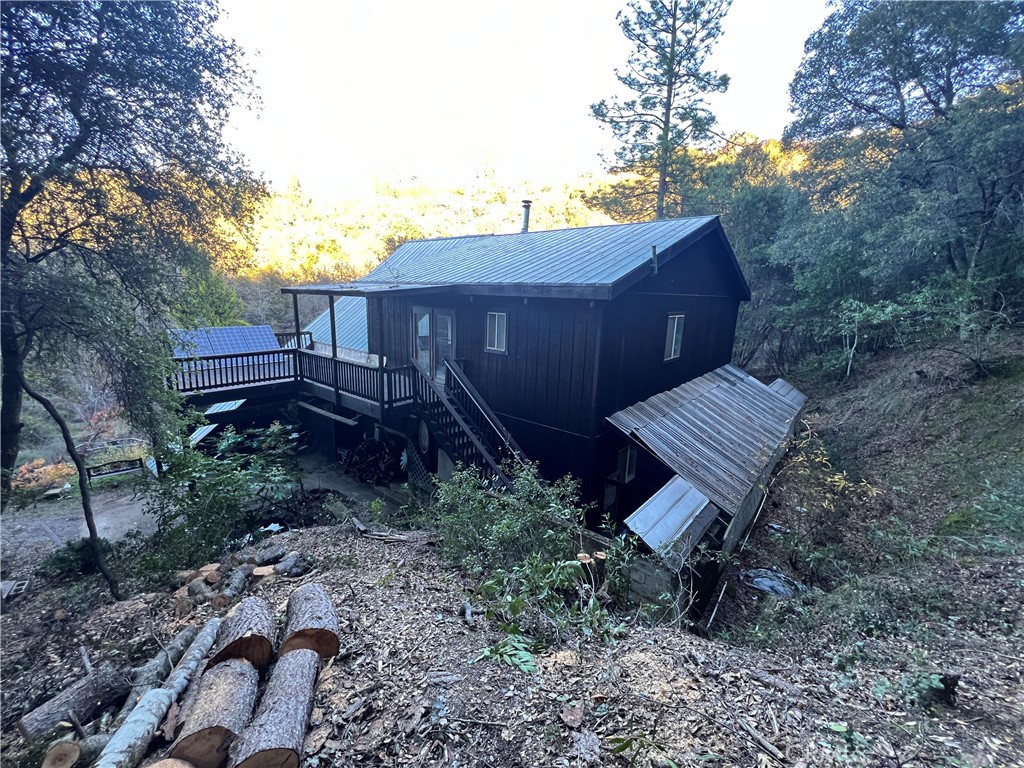 9400 McKinley Road Kelseyville, CA 95451 - Photo 27 of 31 a view of a wooden fence and a bench