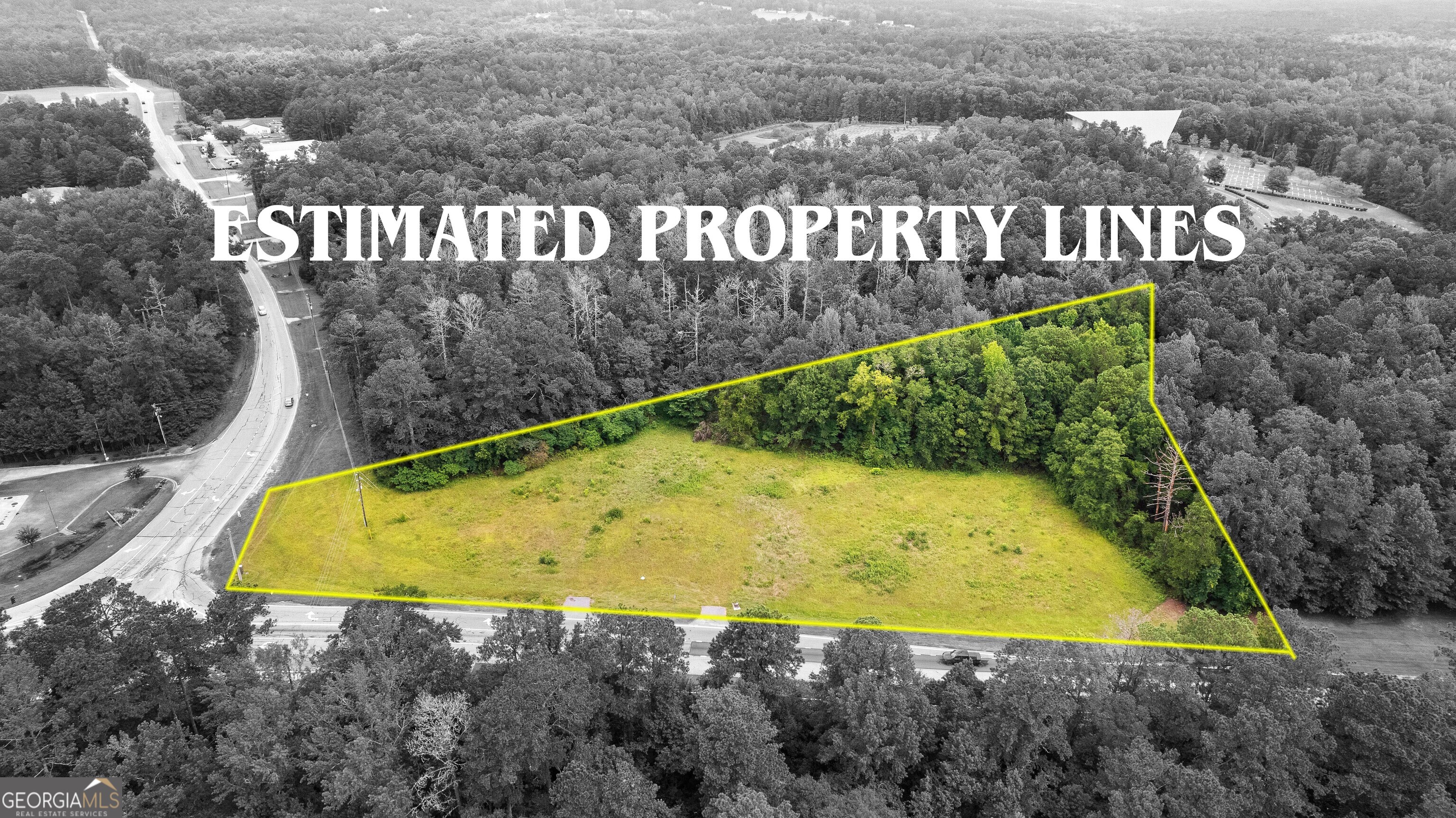 0 Poplar Road Sharpsburg, GA 30277 - Photo 7 of 16 a view of a swimming pool with a yard