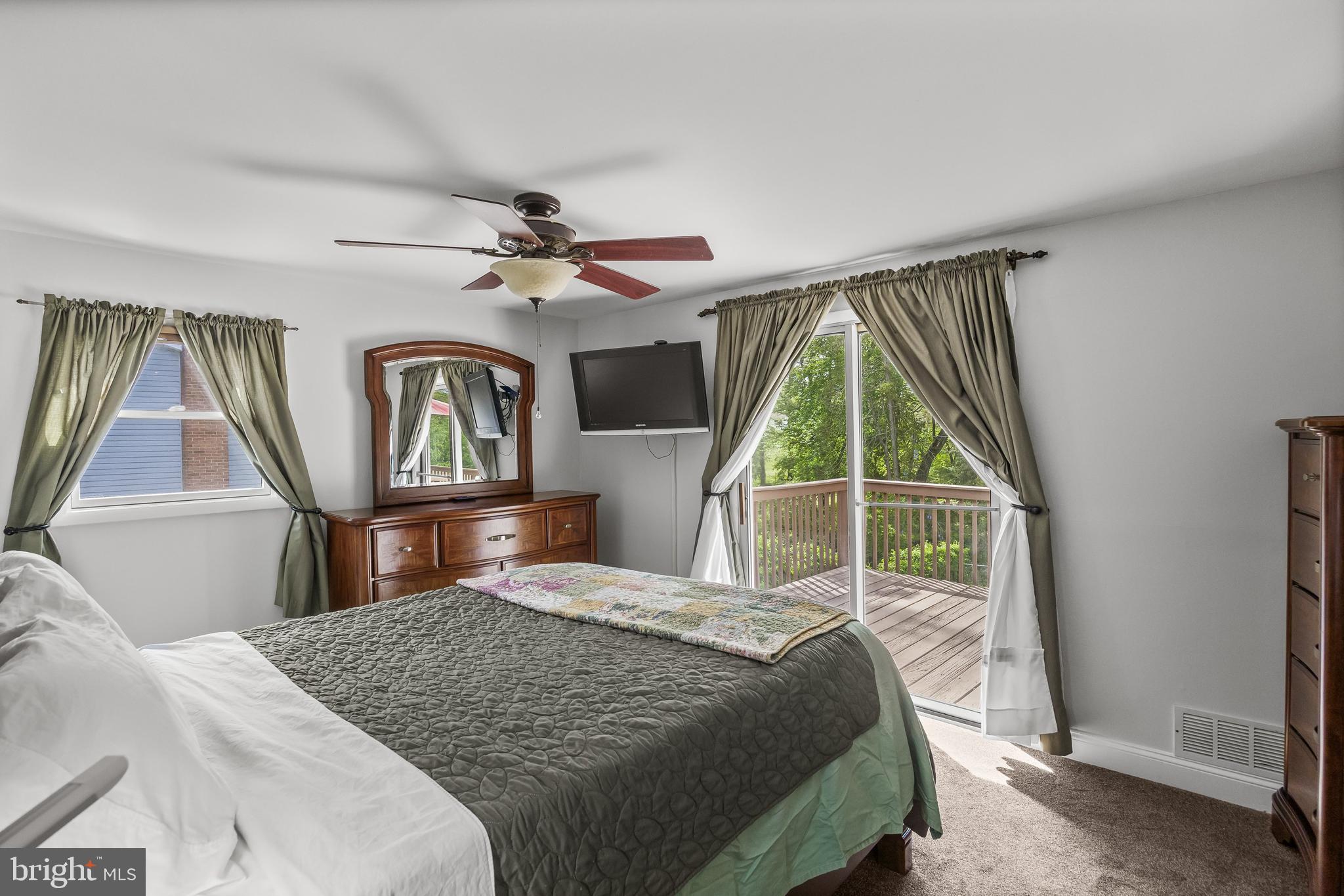 205 Hamilton Road Marlton, NJ 08053 - Photo 11 of 21 a bedroom with a large bed and a window