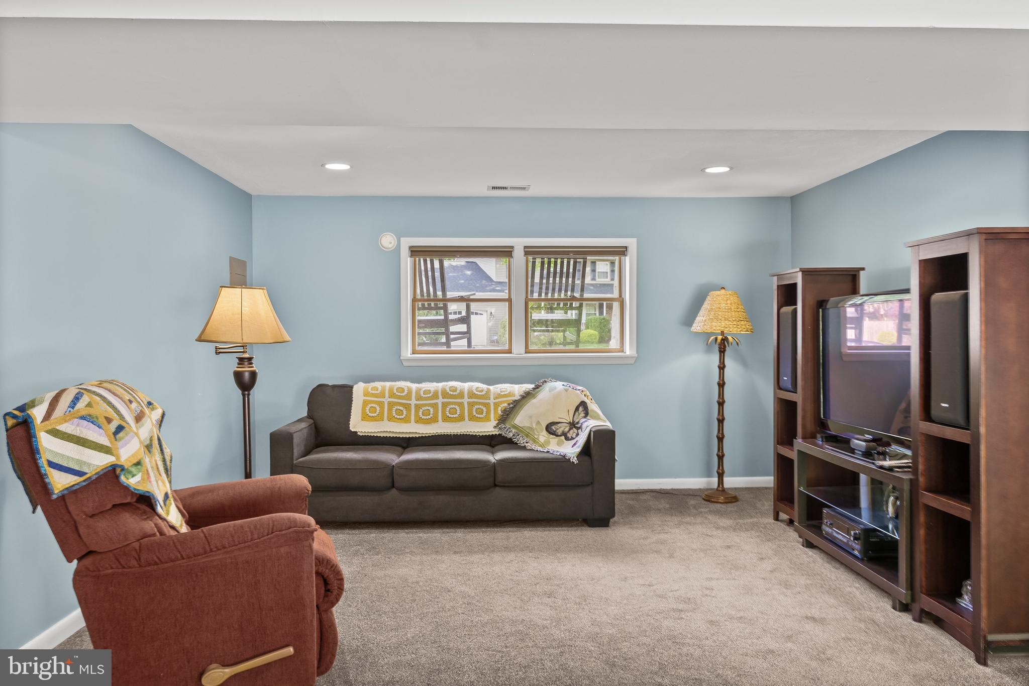205 Hamilton Road Marlton, NJ 08053 - Photo 14 of 21 a living room with furniture a couch and a flat screen tv