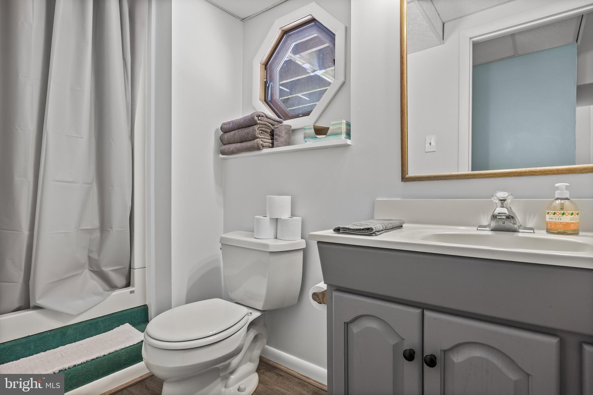 205 Hamilton Road Marlton, NJ 08053 - Photo 15 of 21 a bathroom with a toilet sink and mirror