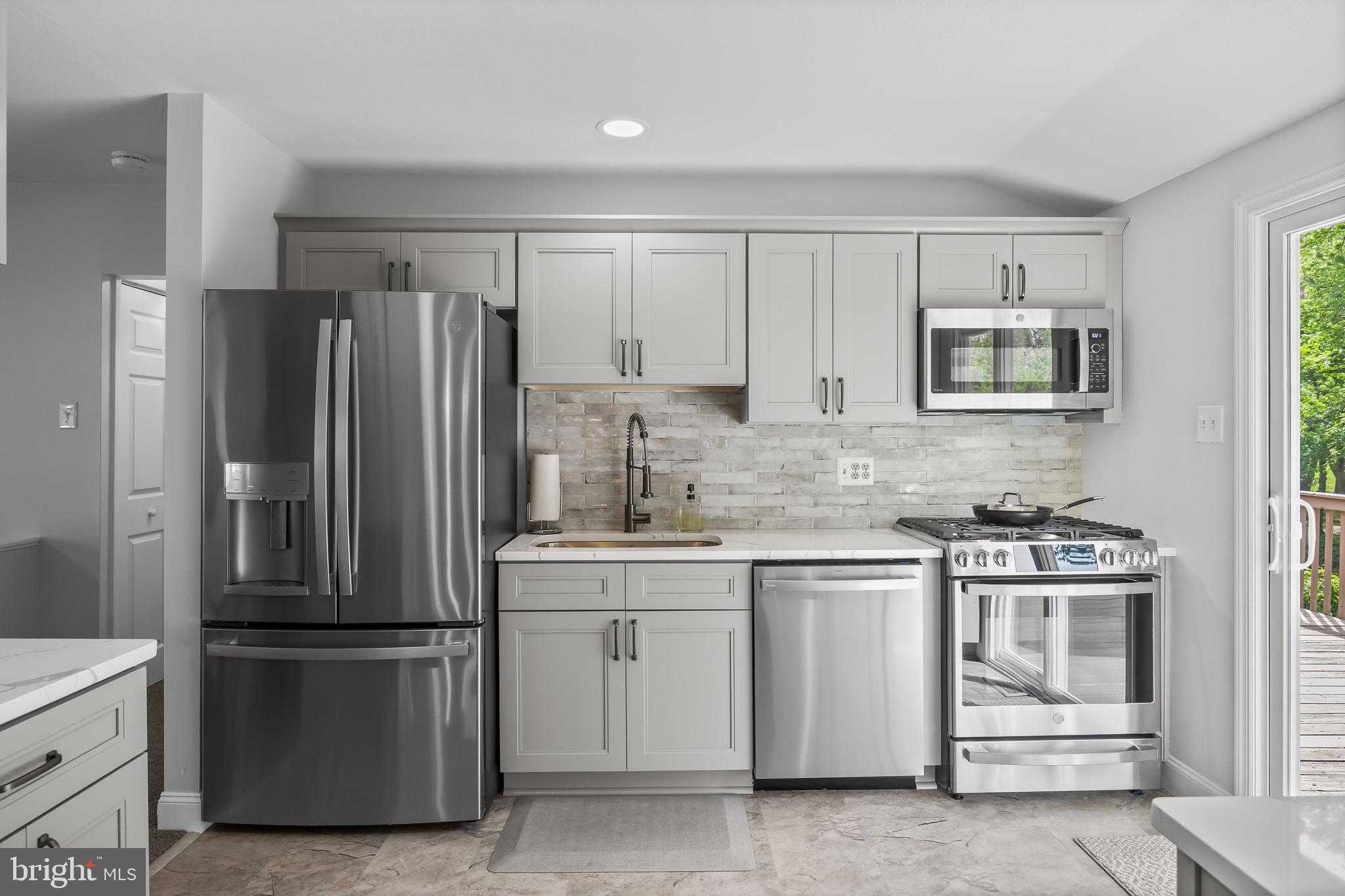 205 Hamilton Road Marlton, NJ 08053 - Photo 9 of 21 a kitchen with stainless steel appliances granite countertop a refrigerator stove and sink