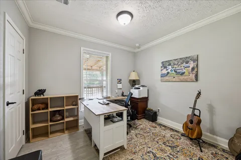 a room with furniture a window and storage