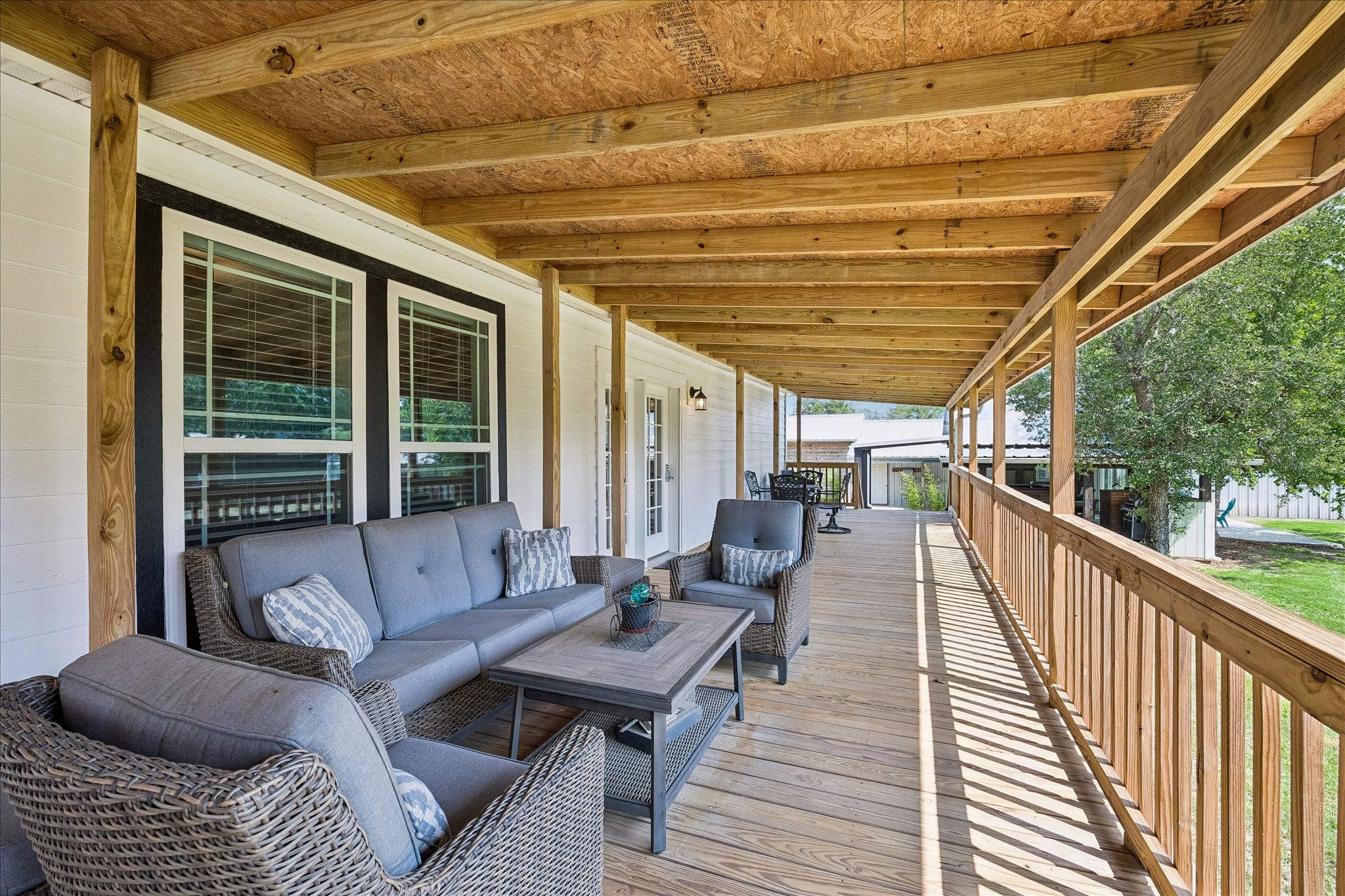 15946 Farm To Market Road 1094 Cat Spring, TX 78933 - Photo 27 of 50 a balcony with furniture and a potted plant