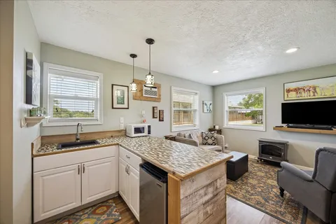 a kitchen with granite countertop lots of counter top space