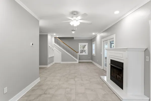 a kitchen with a stove and a refrigerator