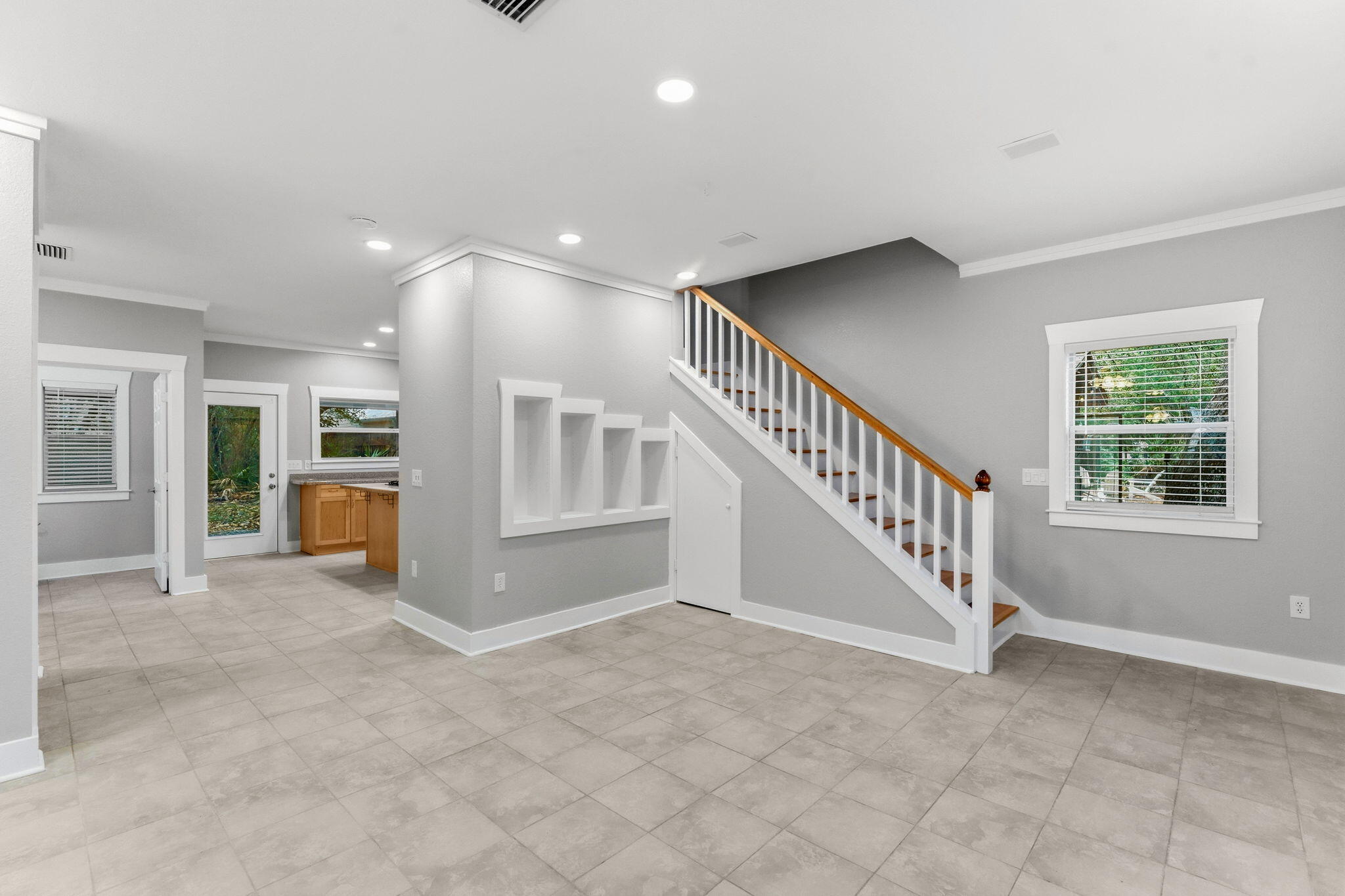128 Bay Magnolia Lane Santa Rosa Beach, FL 32459 - Photo 16 of 61 a view of an entryway with wooden floor and windows