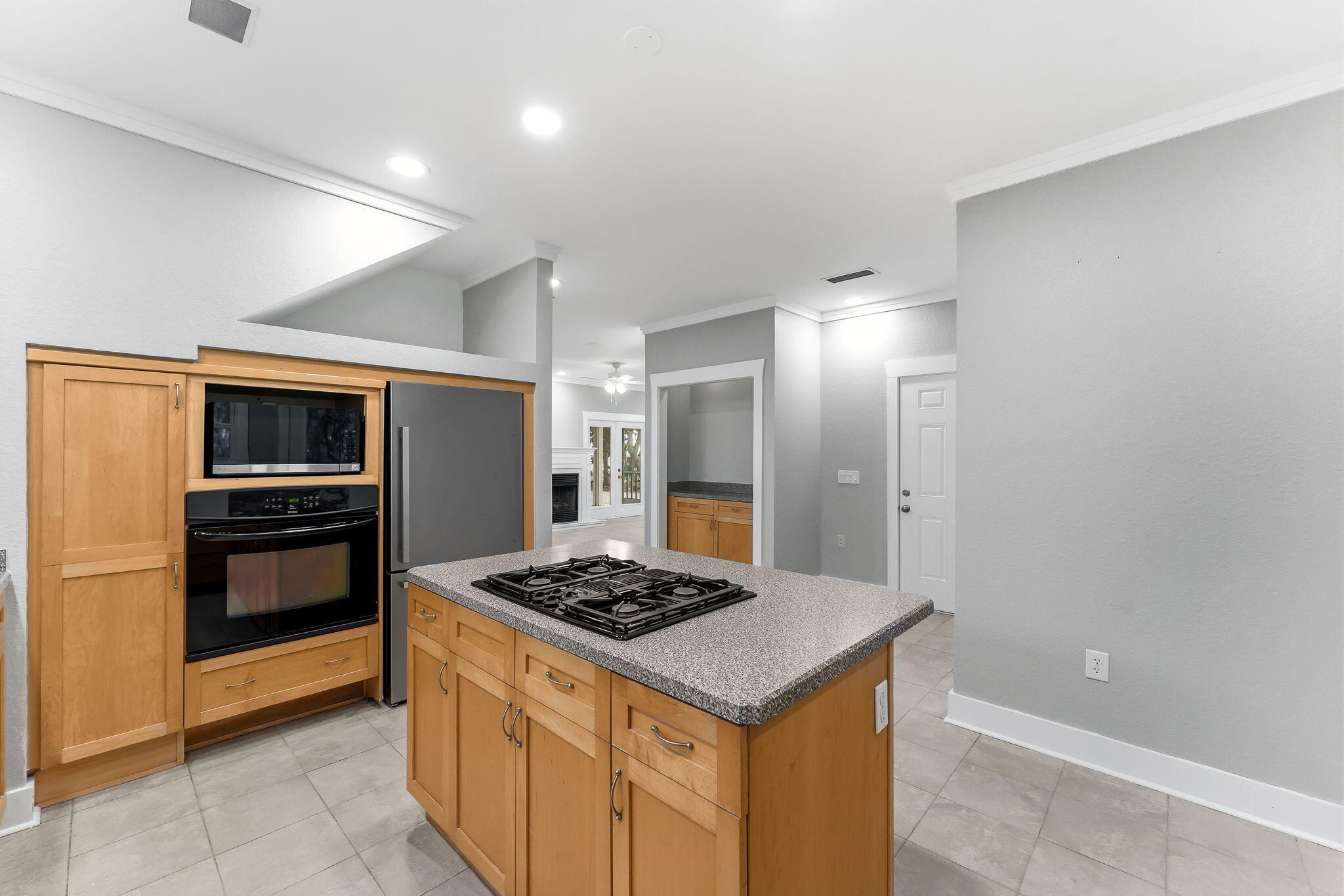 128 Bay Magnolia Lane Santa Rosa Beach, FL 32459 - Photo 20 of 61 a kitchen with a stove and a refrigerator