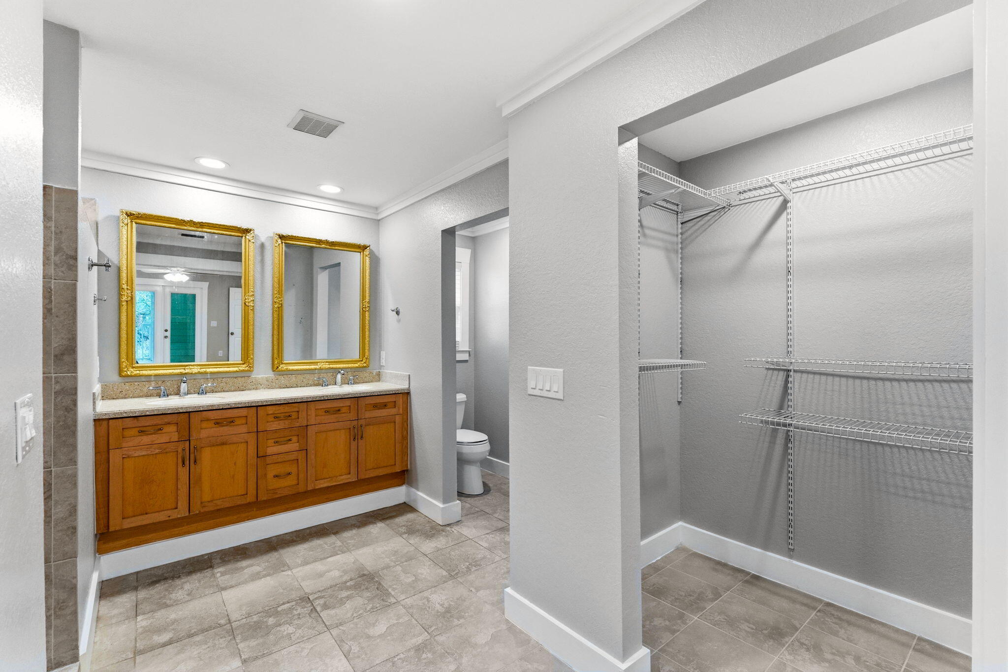 128 Bay Magnolia Lane Santa Rosa Beach, FL 32459 - Photo 26 of 61 a spacious bathroom with a mirror and a shower