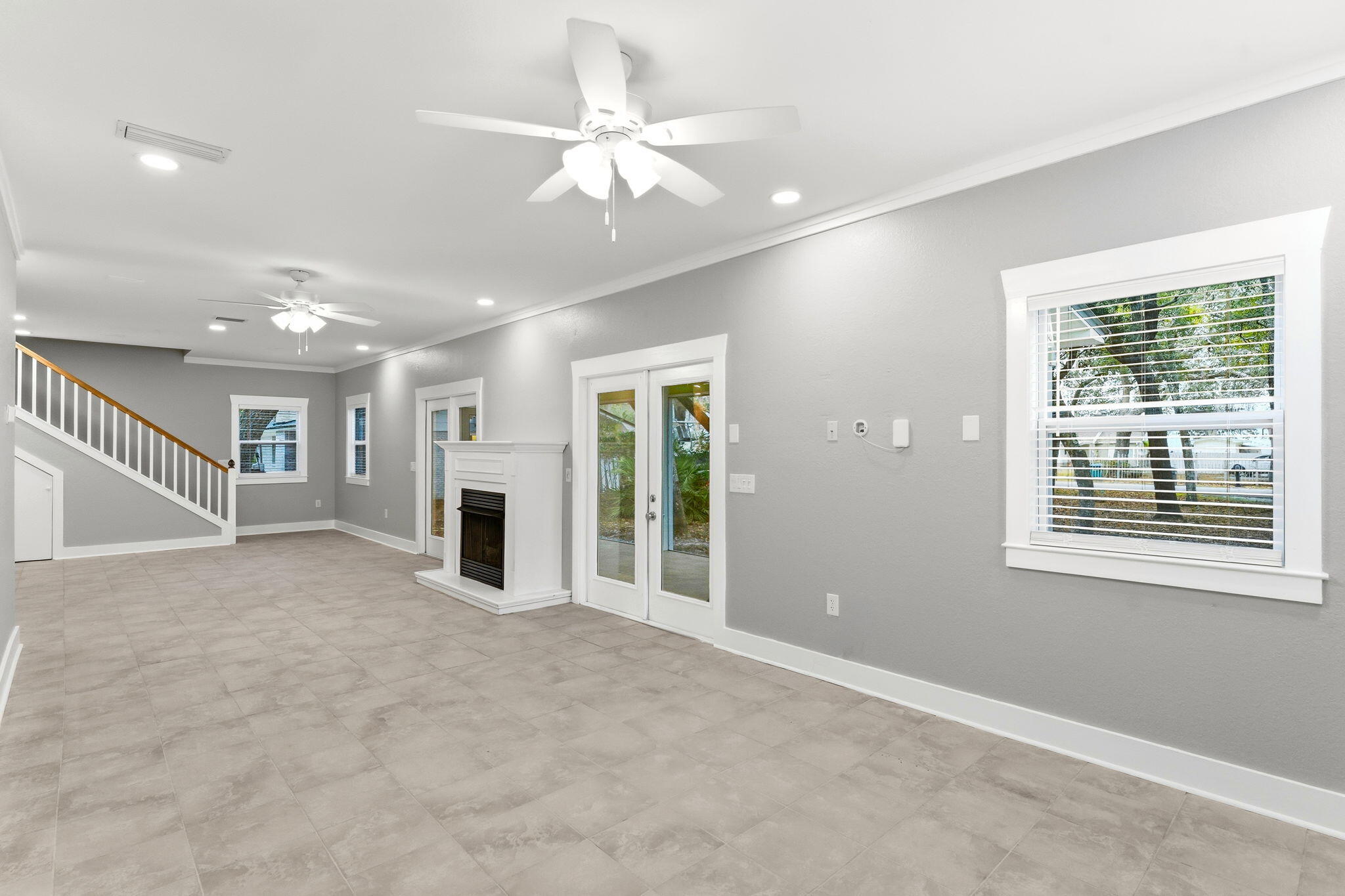 128 Bay Magnolia Lane Santa Rosa Beach, FL 32459 - Photo 3 of 61 a view of an empty room with fireplace and a window