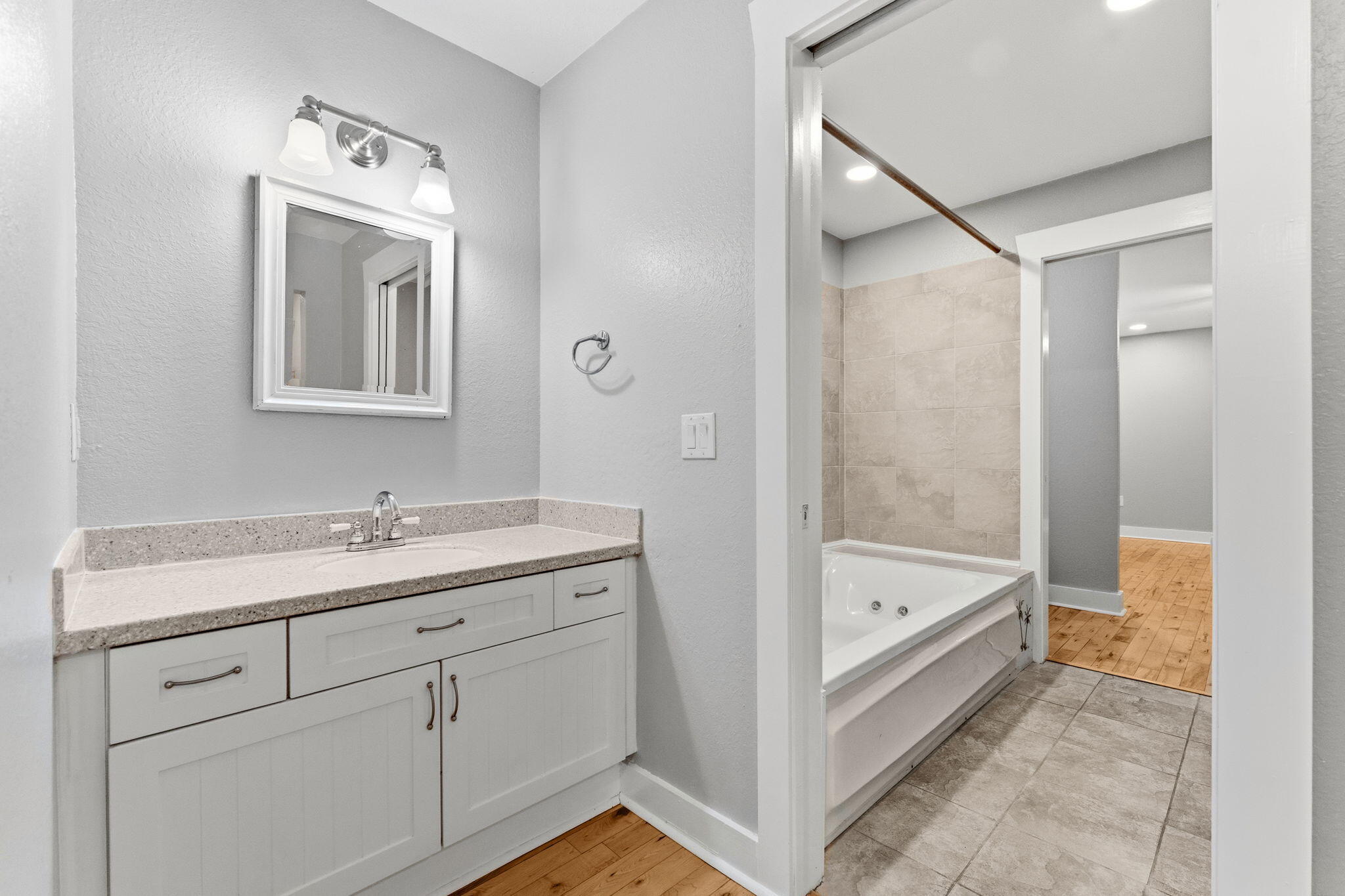 128 Bay Magnolia Lane Santa Rosa Beach, FL 32459 - Photo 34 of 61 a bathroom with a tub sink and mirror