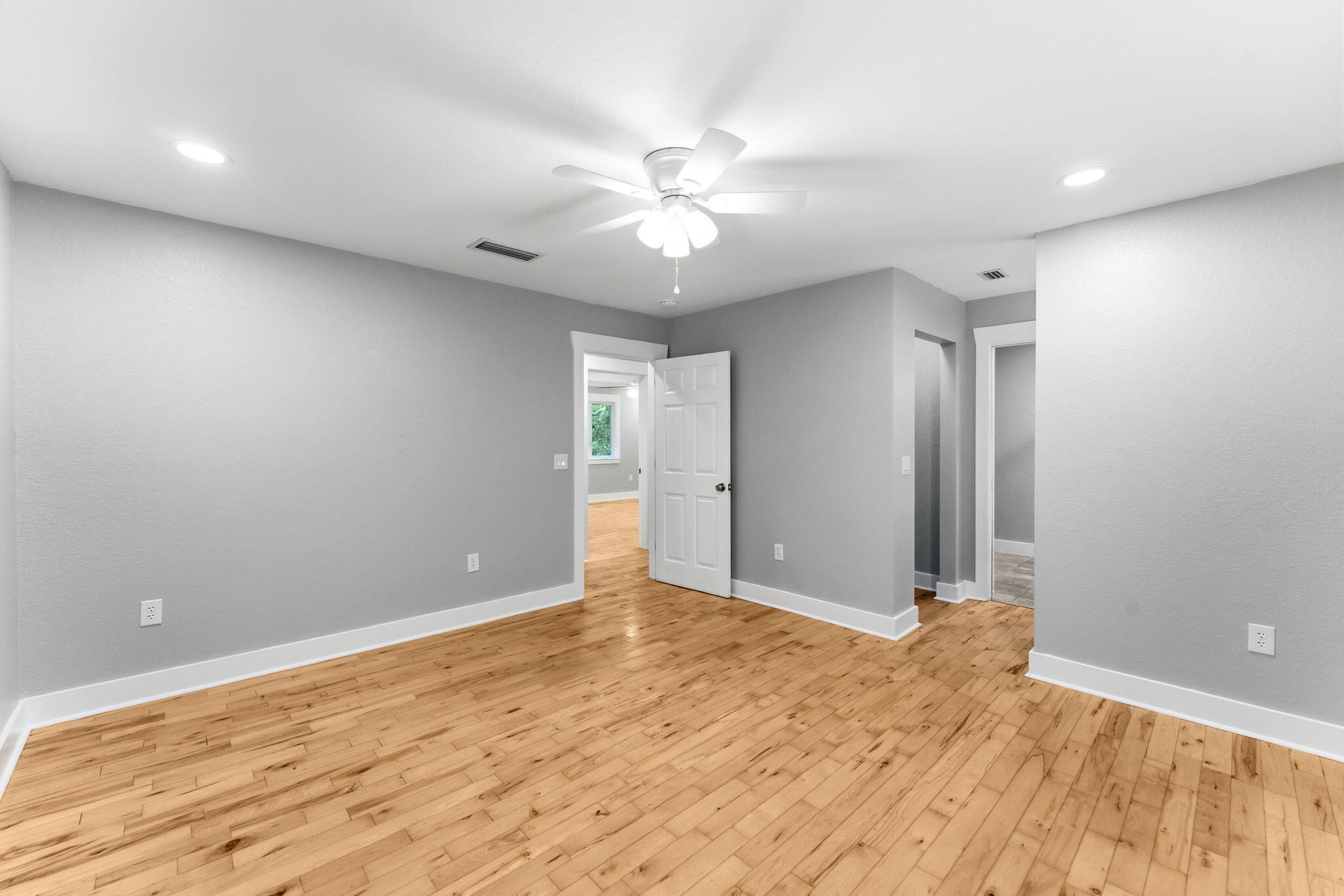 128 Bay Magnolia Lane Santa Rosa Beach, FL 32459 - Photo 40 of 61 a view of an empty room with a chandelier fan