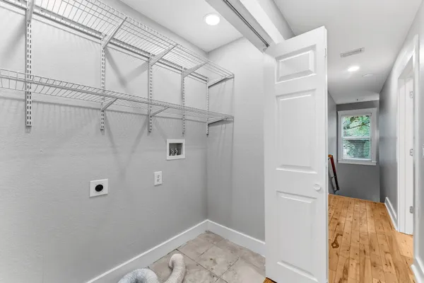 an aerial view of a room with gym equipment