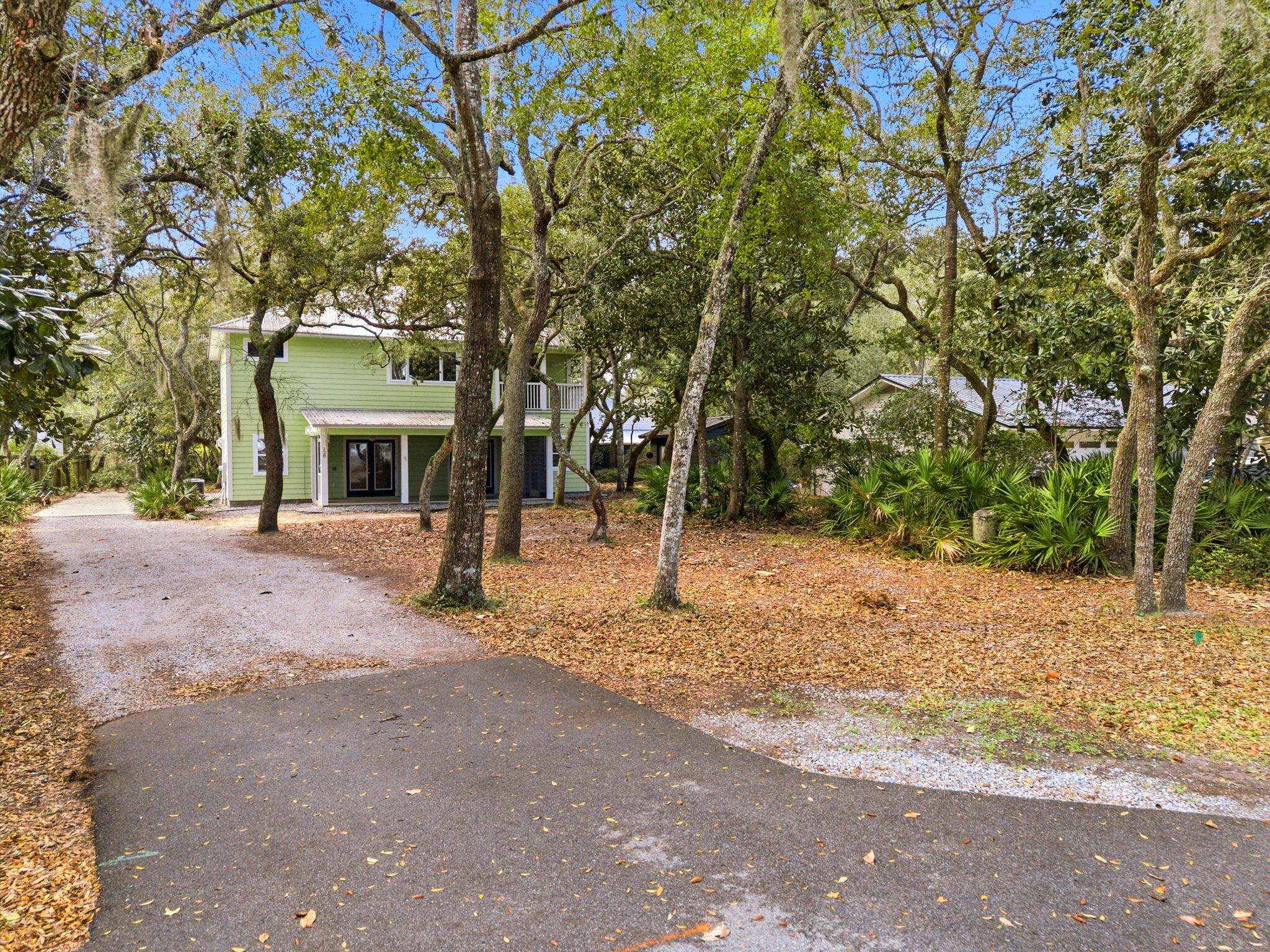 128 Bay Magnolia Lane Santa Rosa Beach, FL 32459 - Photo 44 of 61 a house with trees in front of it