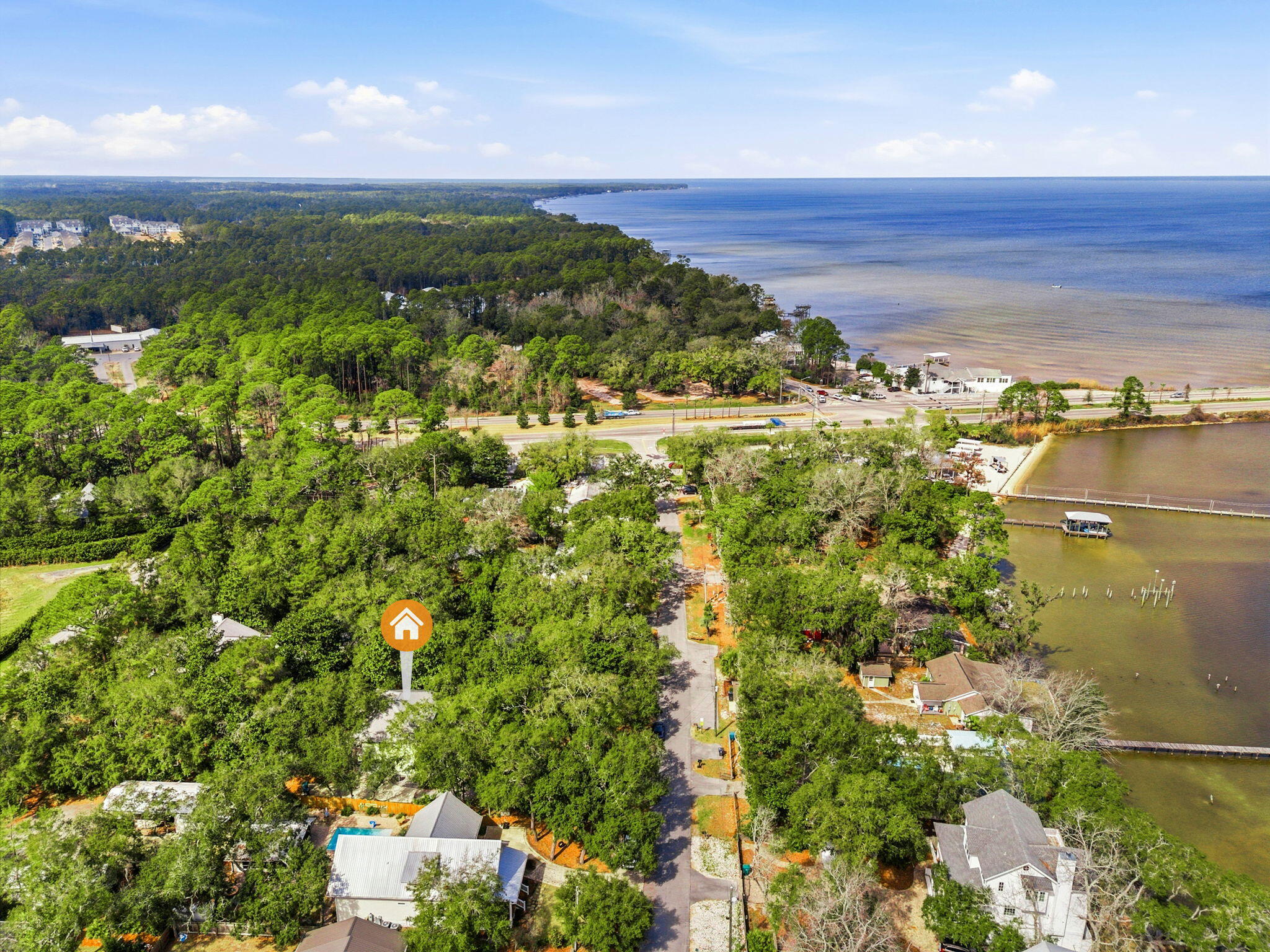128 Bay Magnolia Lane Santa Rosa Beach, FL 32459 - Photo 48 of 61 a view of a houses with a lake view