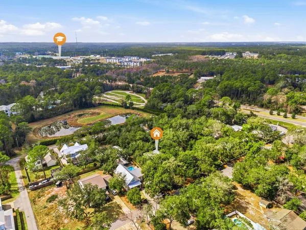 a room with lots of wooden furniture and a table